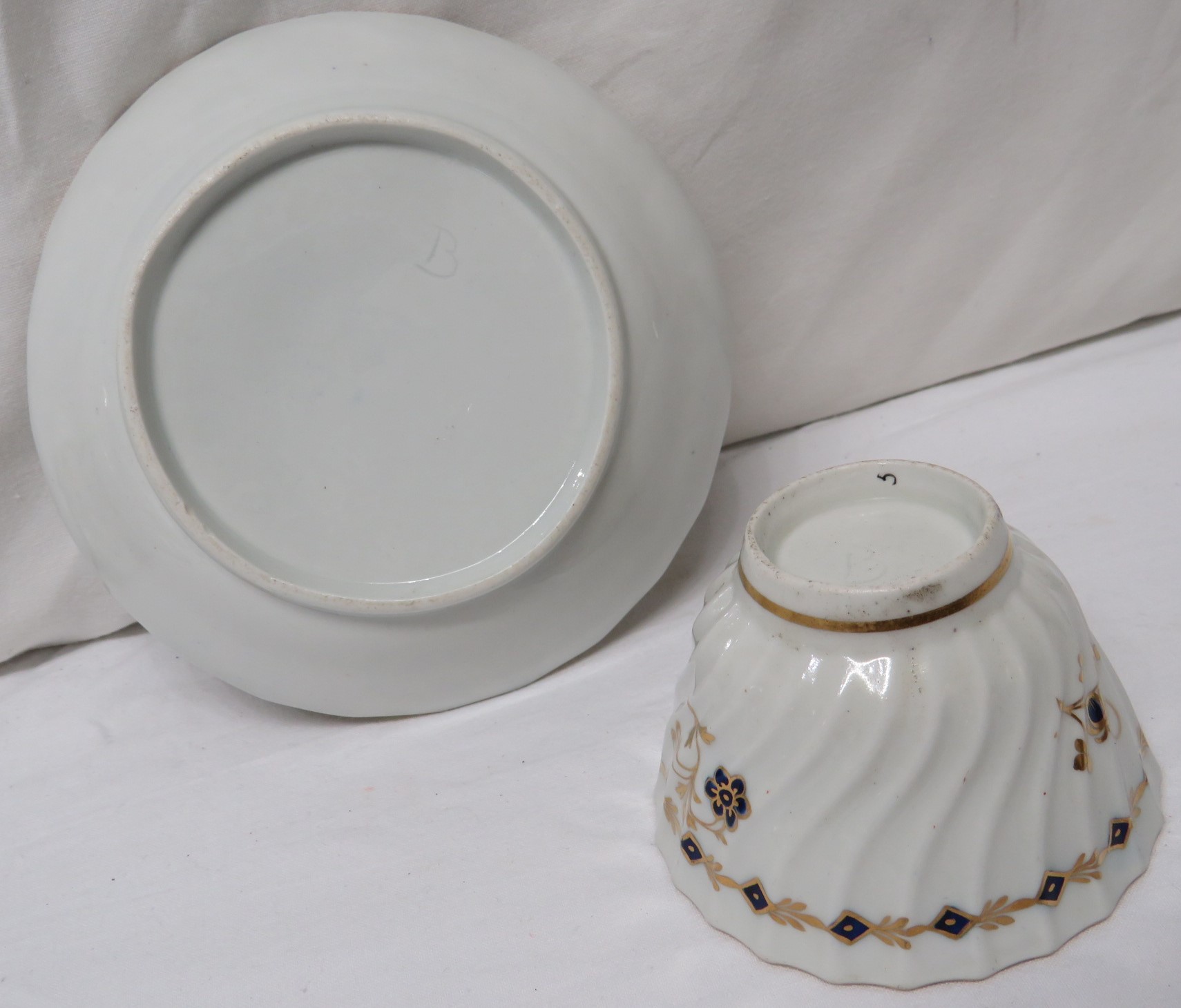 Two 19th century wrythen porcelain tea bowls and saucers, probably Worcester, each similarly - Image 4 of 4