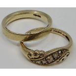 Two rings - a 9 carat gold gypsy ring set with four very small graduated diamonds (the fifth setting