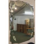 Art Deco shaped rectangular wall mirror, bevelled, with acid etched flowers and opaque darts, height