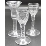 Three 19th century wine glasses - (1) plain Georgian wine glass with trumpet bowl, height 15.5cm; (