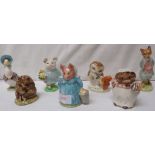 Seven Beatrix Potter Beswick figures, brown backstamps - Mrs Tiggywinkle, Old Mr Pricklepin, Foxy
