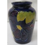 Moorcroft pottery small blue pansies vase, dark blue ground with tubelined decoration of purple