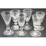 Six 19th century wine glasses - (1) pillar cut bucket bowl of eight facets with single blade knop to