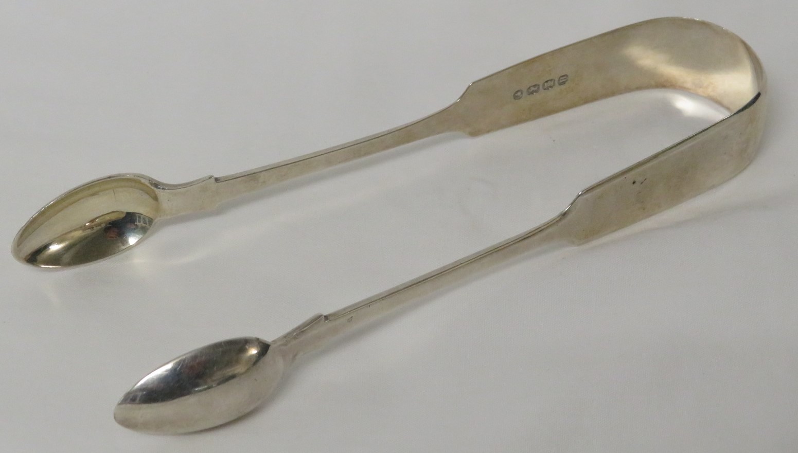 Victorian silver fiddle back sugar tongs, marks for Exeter, 1864, maker's stamp Josiah Williams &