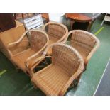 FOUR CANE FRAMED WICKER SEATED CHAIRS