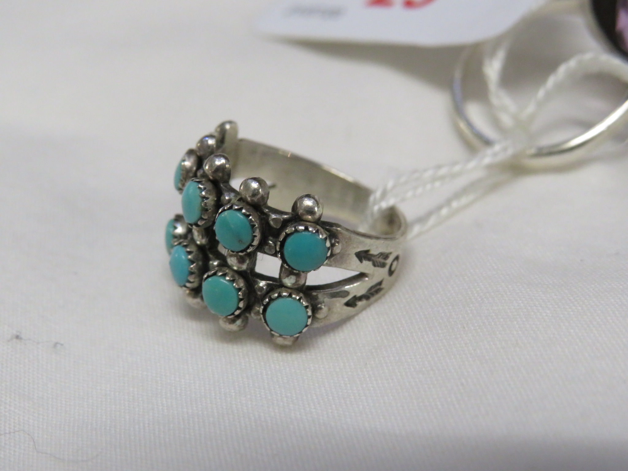 WHITE METAL RING SET WITH TURQUOISE AND STAMPED STERLING, AND A WHITE METAL AMETHYST AND MARCASITE - Image 2 of 3