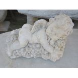 COMPOSITE STONE CHERUB ON BED OF GRAPES