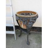 PLANT STAND MADE FROM A VICTORIAN CAST IRON PUB TABLE, RAISED ON THREE PAW FEET, LION HEAD, FIGURE