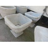 PAIR OF COMPOSITE STONE SQUARE PLANTERS DECORATED WITH ROSES