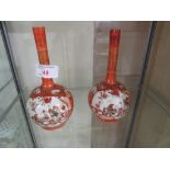 PAIR OF CHINESE PORCELAIN STEM VASES DECORATED IN RED AND PAINTED WITH PANELS OF BIRDS AND FIGURES