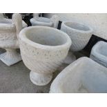 PAIR OF COMPOSITE STONE CIRCULAR PLANTERS WITH AZTEC DECORATION