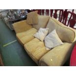 TWO-SEATER SOFA IN PALE GOLD PATTERNED UPHOLSTERY WITH SCATTER CUSHIONS