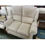 BEIGE UPHOLSTERED TWO-SEATER SOFA