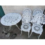 CIRCULAR WHITE METAL TABLE TOGETHER WITH FOUR MATCHING CHAIRS