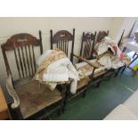 FIVE OAK FRAMED STICK BACK DINING CHAIRS WITH RUSH WOVEN SEATS (FOR RESTORATION)