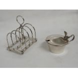 WILLIAM HUTTON & SONS RARE TOAST RACK IN THE MANNER OF CHRISTOPHER DRESER ON FOUR BALL FEET, PATTERN