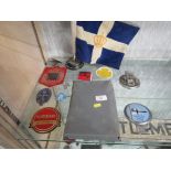 VARIOUS VINTAGE CAR BADGES, TABLE FLAG AND HANDBOOK FOR ROLLS ROYCE SILVER SHADOW AND BENTLEY T, AND