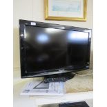 PANASONIC VIERA 32" LCD TELEVISION TX-L32X10B, WITH INSTRUCTIONS AND REMOTE