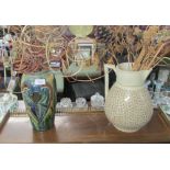 GREEN AND BLUE GLAZED VASE AND CHINA WASH JUG BOTH WITH DRIED PLANT DECORATION