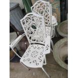 FOUR WHITE PLASTIC AND METAL GARDEN CHAIRS