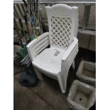 FOUR WHITE PLASTIC GARDEN CHAIRS