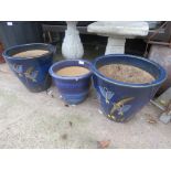 THREE BLUE GLAZED CERAMIC GARDEN POTS