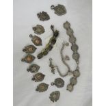 A SILVER FOOTBALL MEDALLION AND TEN OTHER SILVER MEDALLIONS, A CHARM BRACELET, SILVER THREEPENCE