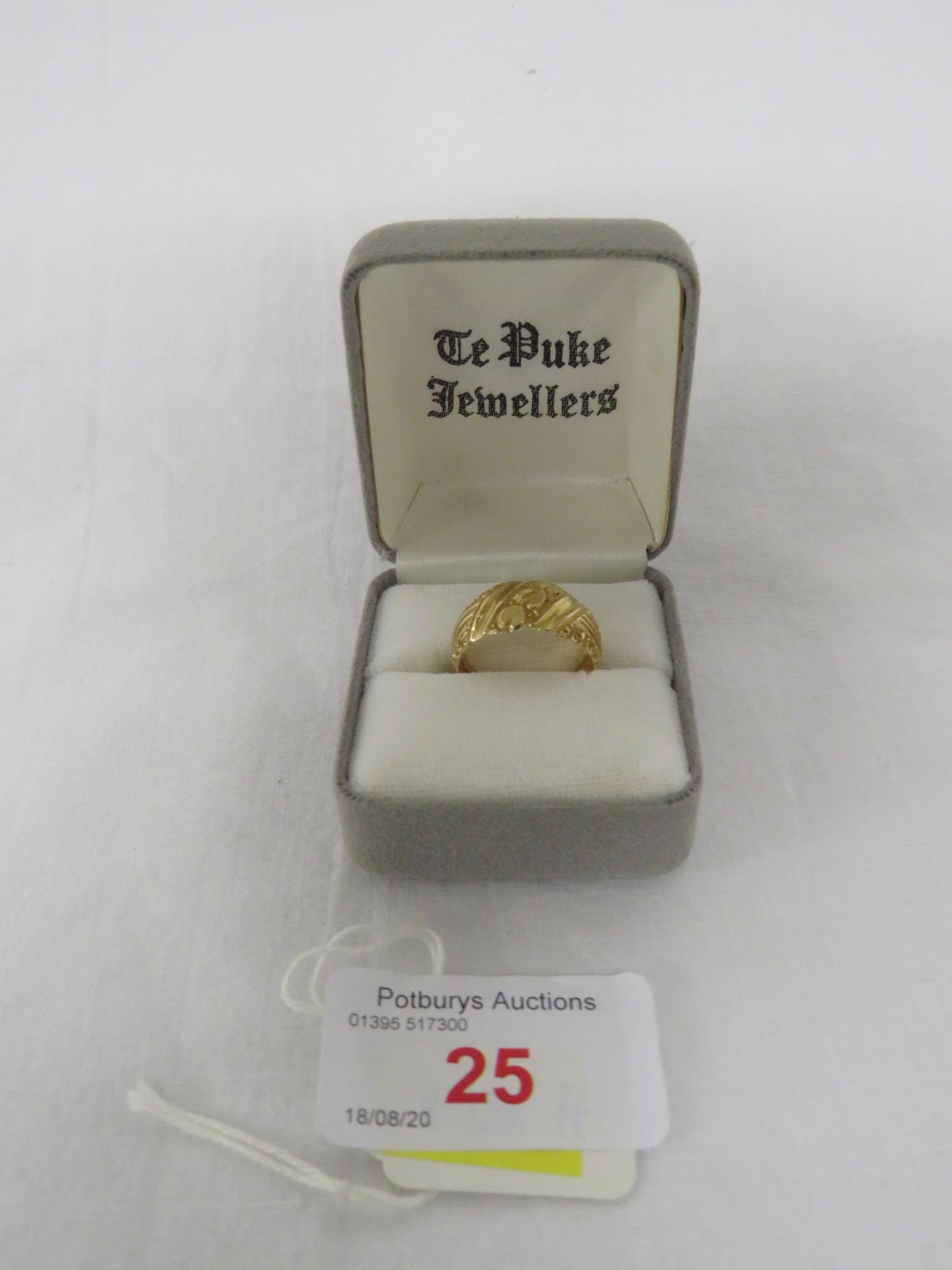 18 CARAT GOLD RING ENGRAVED WITH A ROW OF THREE HEARTS AND FOLIAGE, BRITISH HALLMARKS, 5.8G, WITH