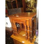 NEST OF THREE STAINED OAK OCCASIONAL TABLES