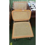 PAIR OF TUBULAR METAL FRAMED CHAIRS WITH CANED SEATS AND BACKS