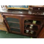 VICTORIAN MAHOGANY TWO-DOOR PART GLAZED CABINET WITH CUSHIONED DRAWER TO TOP (A/F)