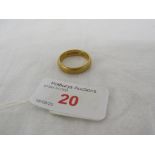 22 CARAT GOLD WEDDING RING, BRITISH HALLMARKS, FAINTLY ENGRAVED WITH A NAME TO THE INSIDE, 8.4G,