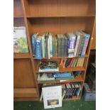 FOUR SHELVES OF FICTION AND REFERENCE BOOKS