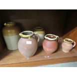 THREE GRADUATED POTTERY JUGS (THE SMALLEST STAMPED LAKES CORNISH POTTERY TRURO) TOGETHER WITH TWO