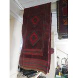 HAND KNOTTED WOOLEN RED GROUND MESHWANI FLOOR RUNNER WITH FIVE MEDALLIONS (257 X 61 CM)