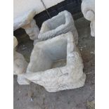 PAIR OF COMPOSITE STONE SQUARE PLANTERS DECORATED WITH IVY