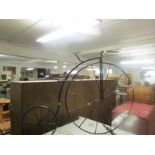 WROUGHT METAL PLANT STAND MODELLED AS A PENNY FARTHING BICYCLE