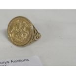 9 CARAT IMPORTED GOLD RING SET WITH THE EMBLEM OF ST GEORGE WITH PIERCED WORK AT THE SHOULDERS, 3.