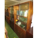 PAIR OF MAHOGANY VENEERED SHELF UNITS WITH SLIDING GLASS DOORS AND TWO DOOR CUPBOARDS TO THEIR