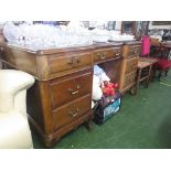 MAHOGANY SEVEN-DRAWER DESK WITH BRASS HANDLES, ON BALL AND CLAW FEET