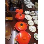 THREE LE CREUSET CAST METAL LIDDED COOKING PANS, MATCHING PAN AND DISH