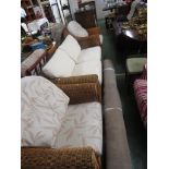 NEXT TWO-SEATER WICKER SOFA, MATCHED WITH A PAIR OF ARMCHAIRS