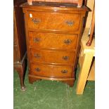 SMALL REPRODUCTION WALNUT VENEER BOW-FRONT CHEST OF FOUR DRAWERS