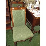 PAIR OF EDWARDIAN OAK FRAMED SIDE CHAIRS WITH GREEN UPHOLSTERED SEATS AND BACKS