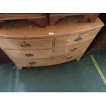 LOW PINE BOW-FRONT CHEST OF TWO SHORT OVER TWO LONG DRAWERS