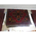 HAND KNOTTED WOOLEN RED GROUND BALUCHI FLOOR RUG (145 X 85 CM)