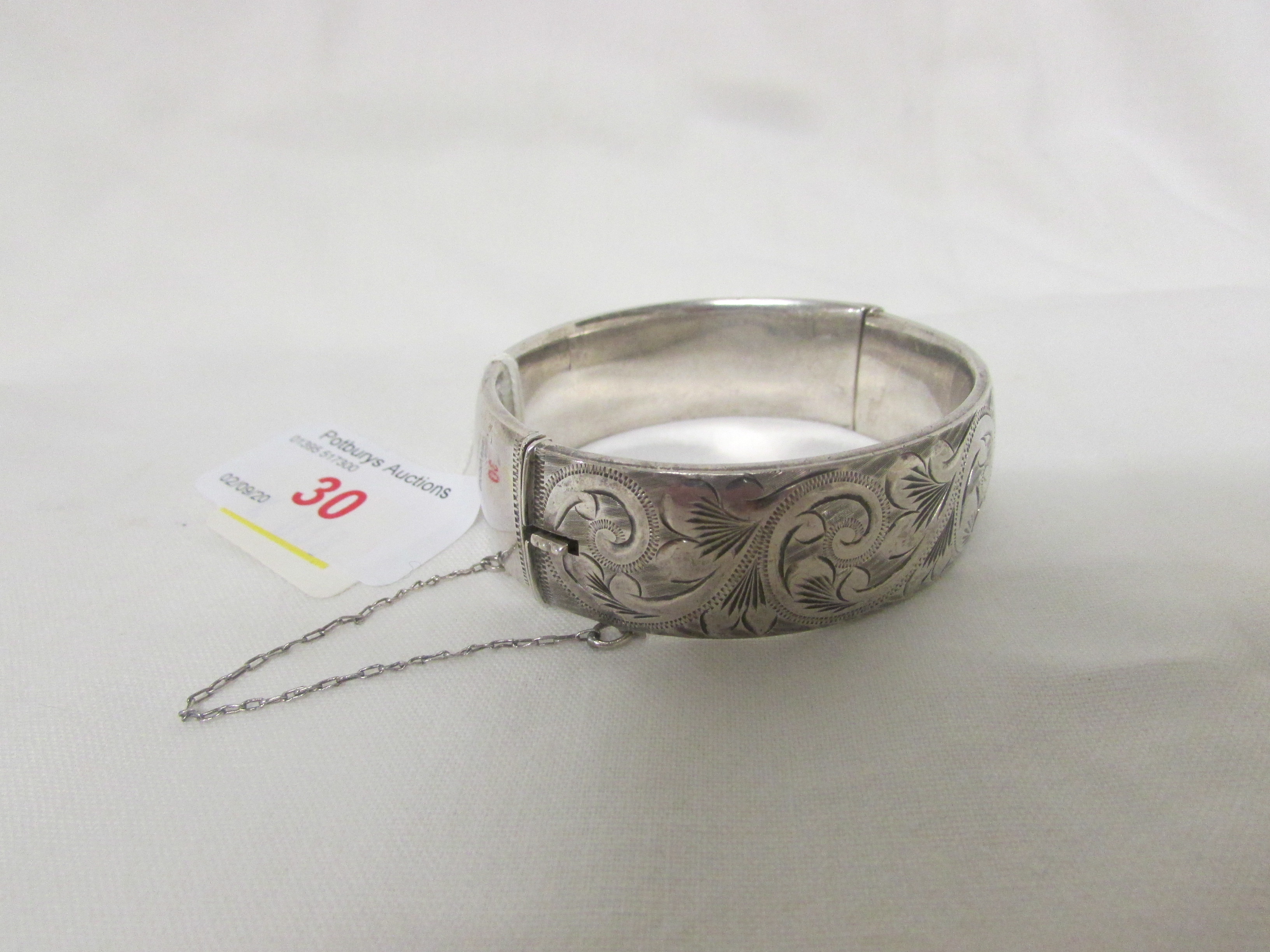 GEORG JENSEN SILVER HALF-ENGRAVED BANGLE WITH SAFETY CHAIN, MARKS FOR LONDON, 1963 AND MAKER'S