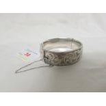 GEORG JENSEN SILVER HALF-ENGRAVED BANGLE WITH SAFETY CHAIN, MARKS FOR LONDON, 1963 AND MAKER'S