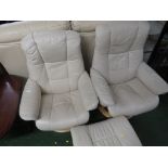 TWO STRESSLESS CHAIRS IN CREAM LEATHER WITH ONE MATCHING FOOTSTOOL