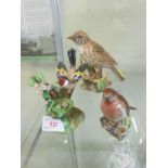 J T JONES CROWN STAFFORDSHIRE FIGURE OF GOLDFINCH WITH NEST, A BESWICK ROBIN, AND A CHINA THRUSH